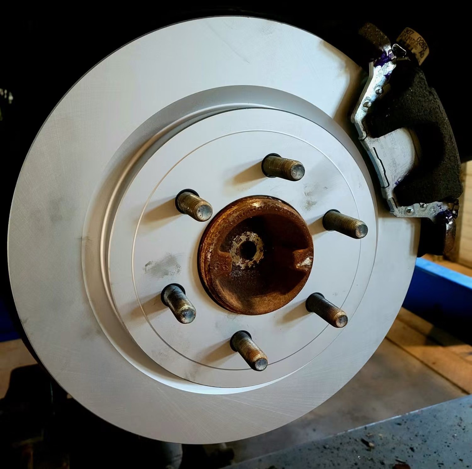 New brake rotor and pads installed
